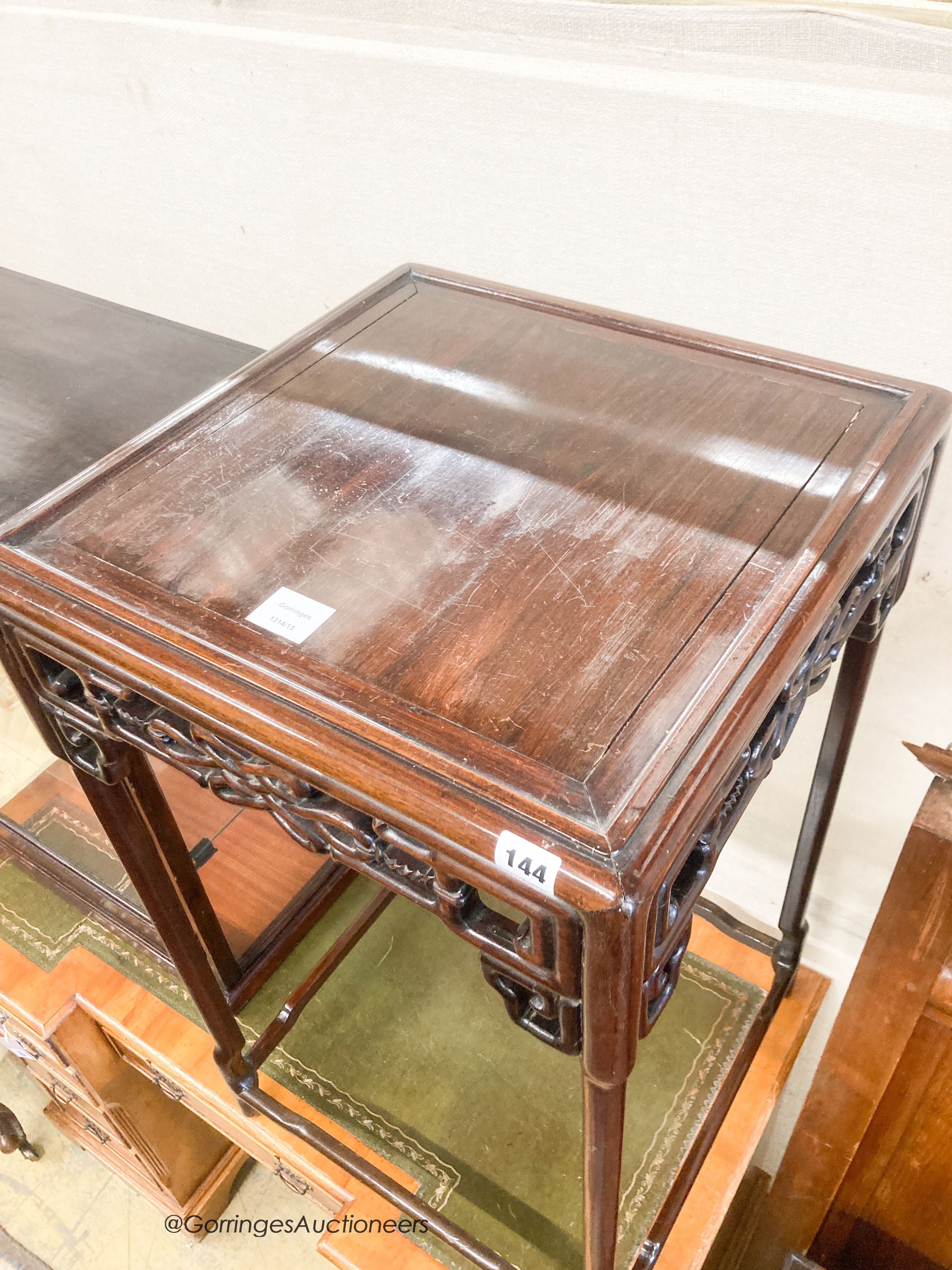 A Chinese hardwood square topped table, width 47cm, height 83cm